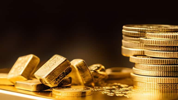 Gold gains on soft dollar, rate cut hopes