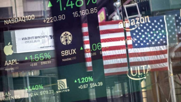 Nasdaq, S&P 500 ride chip-stock wave before Fed decision; Microsoft falters