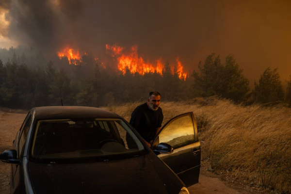 Wildfire rages out of control on the outskirts of Athens